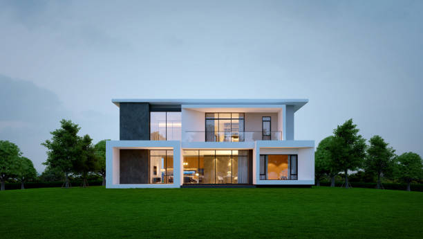 Modern house exterior evening view with interior lighting.3d rendering stock photo