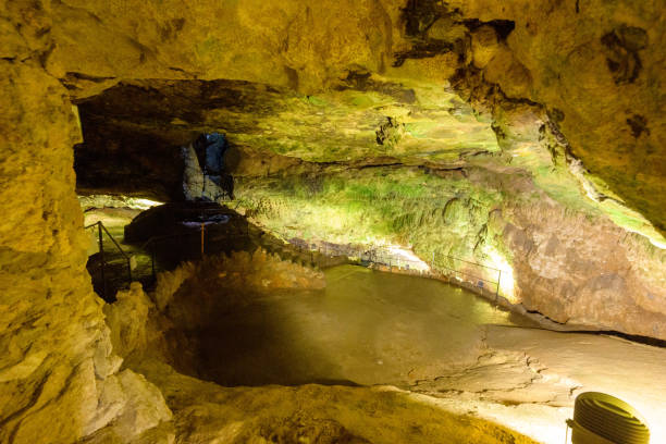 istock karst cave under Bojnice Castle with a lake 1412010892