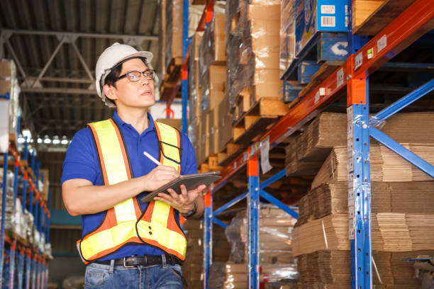 istock Warehouse senior staff portrait. 1412011161