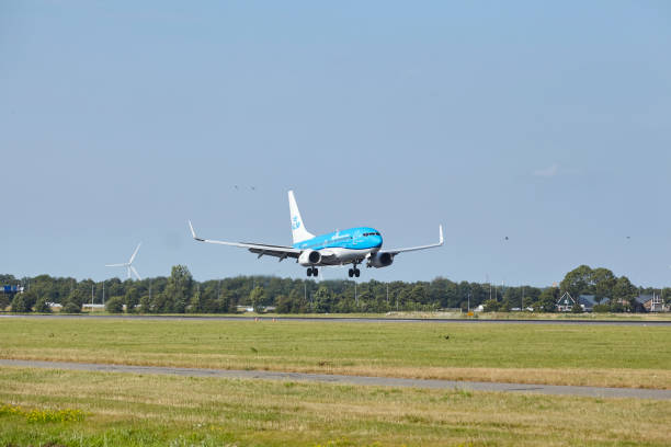 Amsterdam Airport Schiphol - Boeing 737-7K2 of KLM lands Amsterdam, The Netherlands - July, 24, 2022. The Boeing 737-7K2 of KLM Cityhopper with the identification PH-BGH lands at Amsterdam Airport Schiphol (The Netherlands, AMS, runway Polderbaan) on July 24, 2022. klm stock pictures, royalty-free photos & images