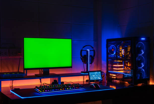 istock High-End Computing gaming set monitor green screen with screen showing computer status 1412017412