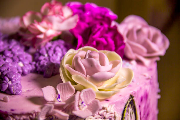 istock a cream flowers on the birthday cake 1412020054