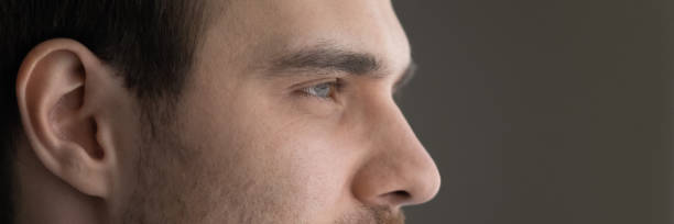 istock Wide image banner dreamy motivated man eyes cropped close up 1412021481