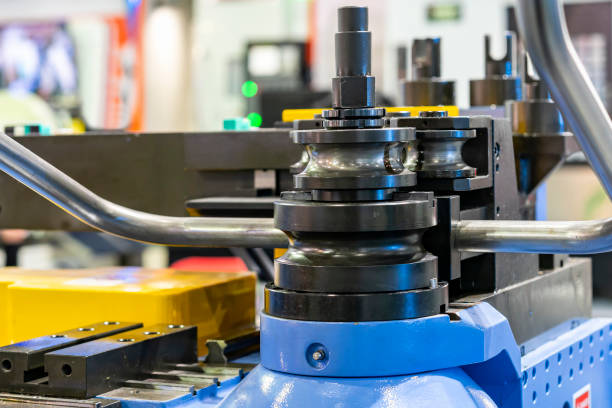 istock Close up bending clamp die component set of precision automatic cnc hydraulic press pipe or tube 3d bending machine for manufacturing process in industrial 1412021725