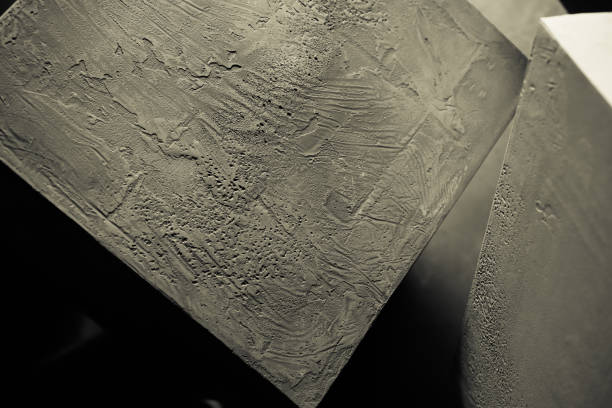 istock Cement block  near wall as construction concept. Concrete cubes as abstract background 1412025008