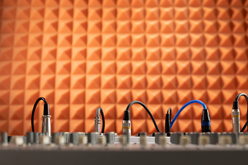 Auidio jack cable and sound mixer. Music concept in sound record studio