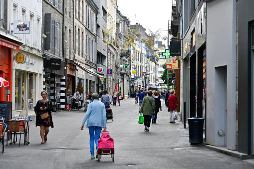 Saint-Brieuc, France, June 29, 2022 - People on Rue Saint-Guillaume, a shopping street in Saint-Brieuc