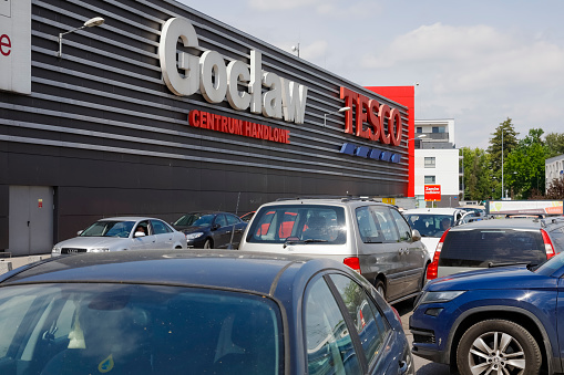 Warsaw, Poland - May 26, 2019: Cars are parked in front of the famous brand shopping center in the district called Goclaw