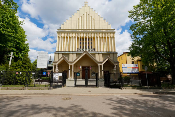 The front facade of a large church  in Saska Kepa housing district stock photo
