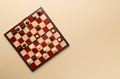 Chess on color background, top view.