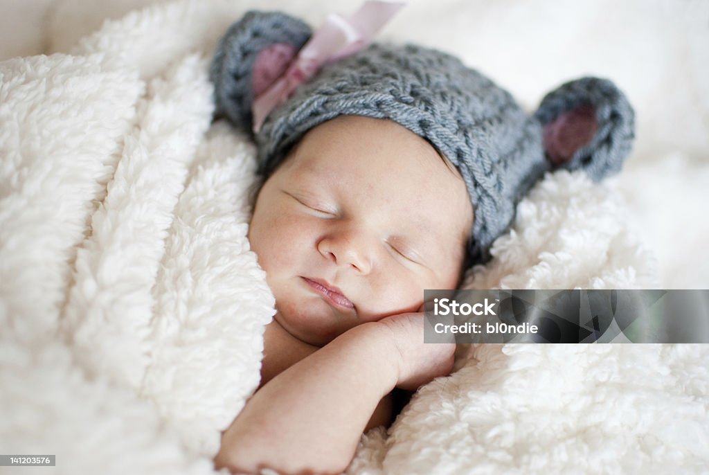 Sleeping baby Sleeping baby in a blanket and hat Affectionate Stock Photo