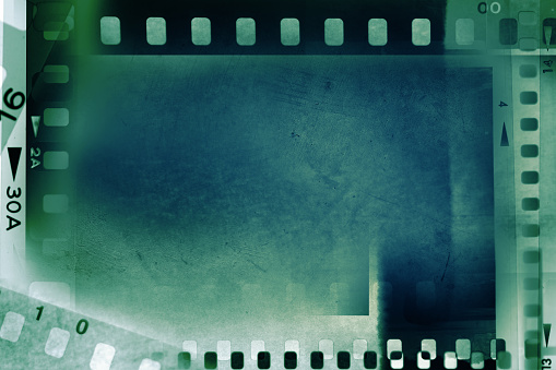 Blue green film strip negative frames background