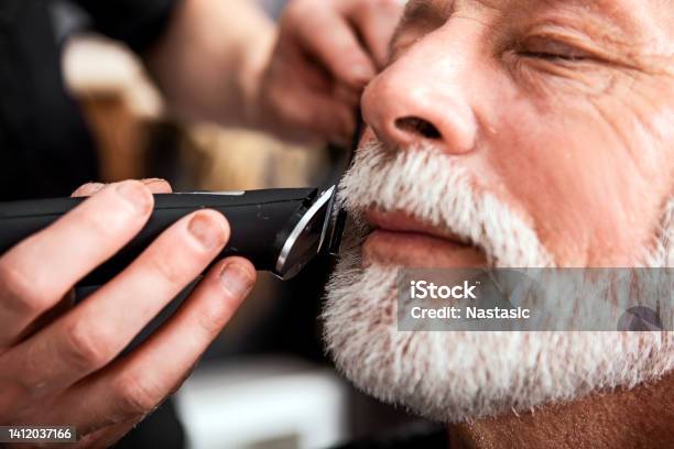 Senior Man In Barber Shop Stock Photo - Download Image Now - Barbers Pole, 60-69 Years, 65-69 Years