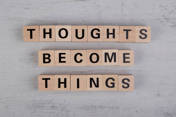 istock wooden cubes showing the words thoughts become things 1412042514