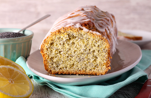 Lemon and poppy seed cake, sliced and served