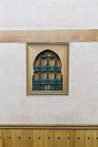 istock Tiny closed security window with wood and iron fence in old Arabian style in Marrakesh landmark 1412045974