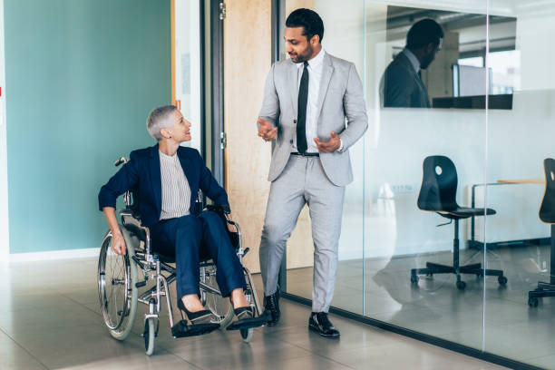 istock Business partners in discussion 1412049432