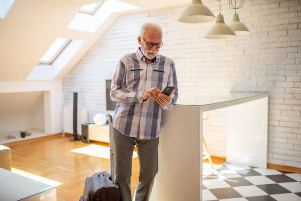 istock Pensioner is preparing for a trip 1412053100