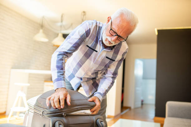 istock Pensioner is preparing for a trip 1412053112