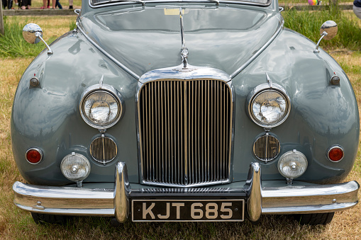 West Bay.Dorset.United Kingdom.June 12th 2022.A Jaguar Mark 9 is on display at the West Bay vintage rally