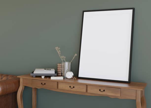 istock Empty vertical picture frame on green wall in modern living room. Mock up interior in contemporary, classic style. Free, copy space for your picture. Close up view. 3D rendering. 1412055685