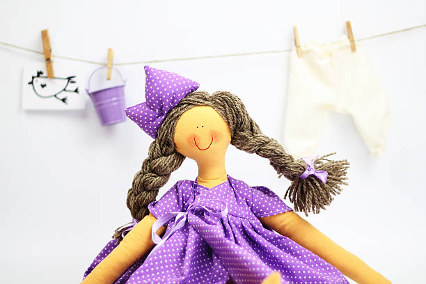 Lilac collector rag doll stock photo