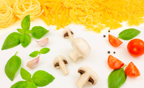 Ingredients for preparing different types of pasta. Italian cuisine.