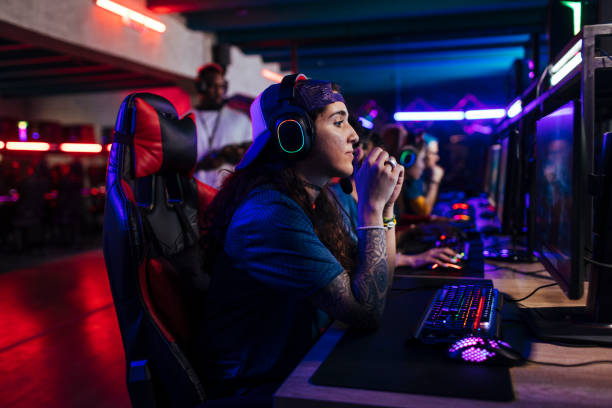 istock Girl gamer wearing a baseball cap 1412059685