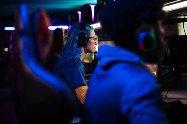 istock Blue-haired girl gamer 1412059695