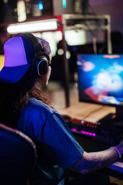 istock Girl is playing a video game 1412059697