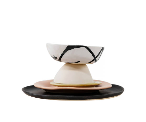 istock HANDMADE CERAMIC BOWLS AND PLATES STACKED UP 1412071777