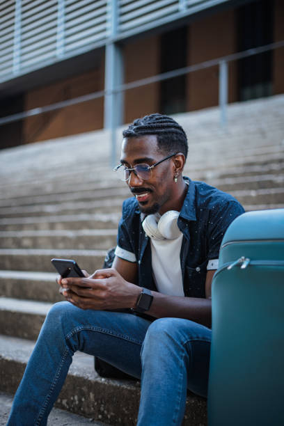istock African male using social media 1412076085