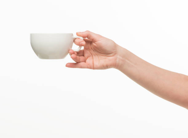 istock hands holding a cup on a white background isolated 1412079458