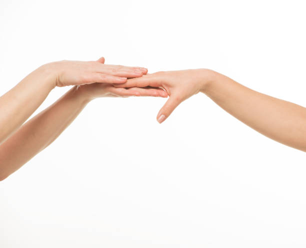 hands doing hand massage on white background isolated stock photo