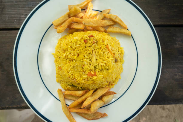 istock Top view of a rice with chicken served on a white plate 1412083423