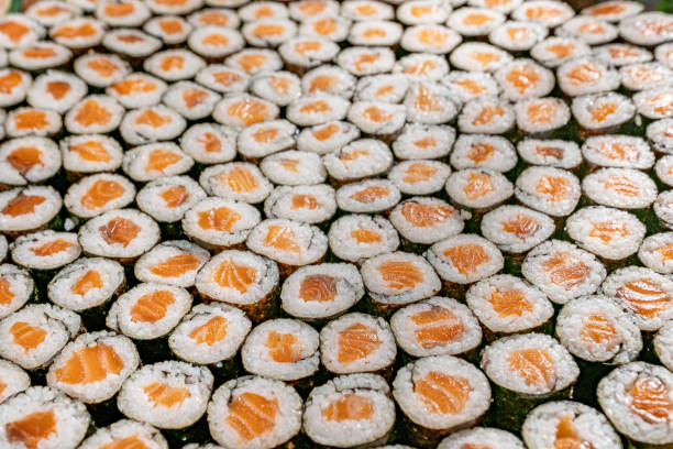 delicious sushi rolls with various tastes - sushischotel stockfoto's en -beelden