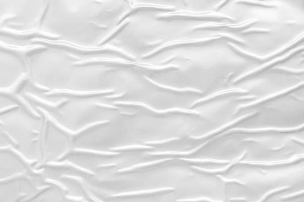 istock white crumpled and creased plastic poster texture background 1412087751