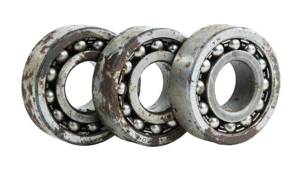 istock Bearing on a white background. Old worn bearing covered with rust 1412088221