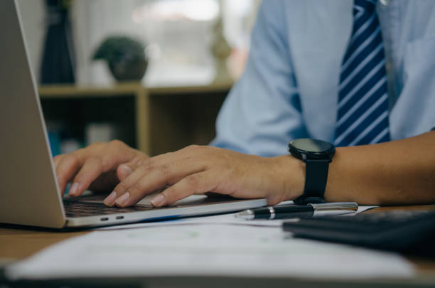 istock Business typing keyboard computer laptop technology online digital marketing and internet communication social network on table at office. 1412089797