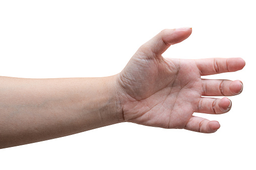 isolated of a woman's hand holding something like a bottle or can.