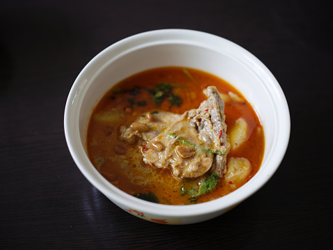 Chicken Mussaman Curry on white bowl