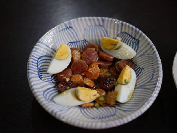 istock Spicy Chinese pork sausage with boiled egg Thai salad 1412112911