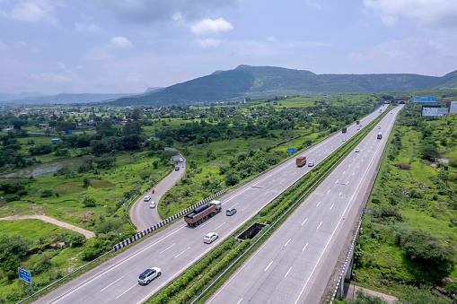 Aerial view of Mumbai-Pune Expressway during the monsoon season near Pune India. The Expressway is officially called the Yashvantrao Chavan Expressway.