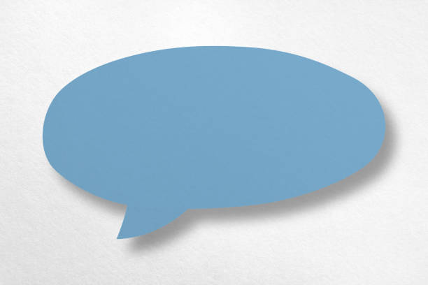istock Speech balloon shaped blue paper isolated on white background. 1412124859