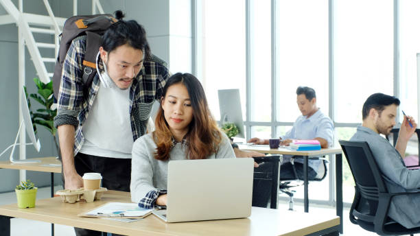 istock Creative team discussing about work at office, Small business teamwork planing business strategy, office life 1412133239
