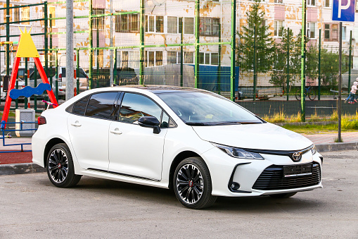 Novyy Urengoy, Russia - June 24, 2021: Brand new car Toyota Corolla in the city street.