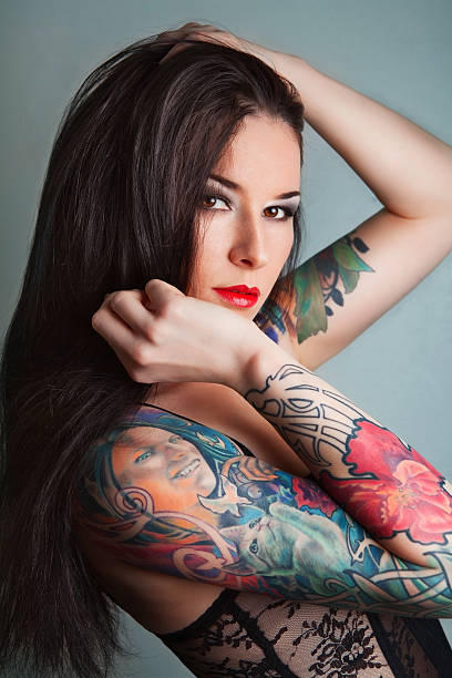 istock pretty young girl with tattoo 141213826