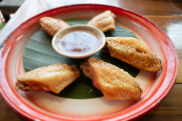 istock Fried chicken wings with sweet sauce 1412138812