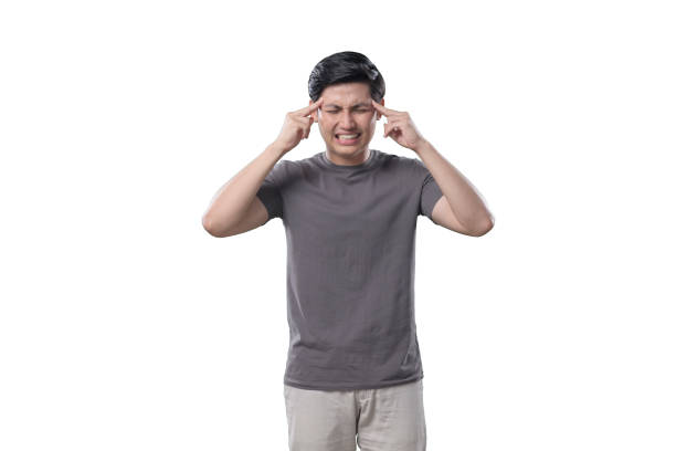 istock Indonesian Man on white Background looking furstrated massaging his head 1412143550