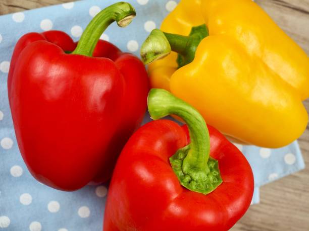 istock Fresh Organic Vegetables Yellow and Red Paprika 1412143730